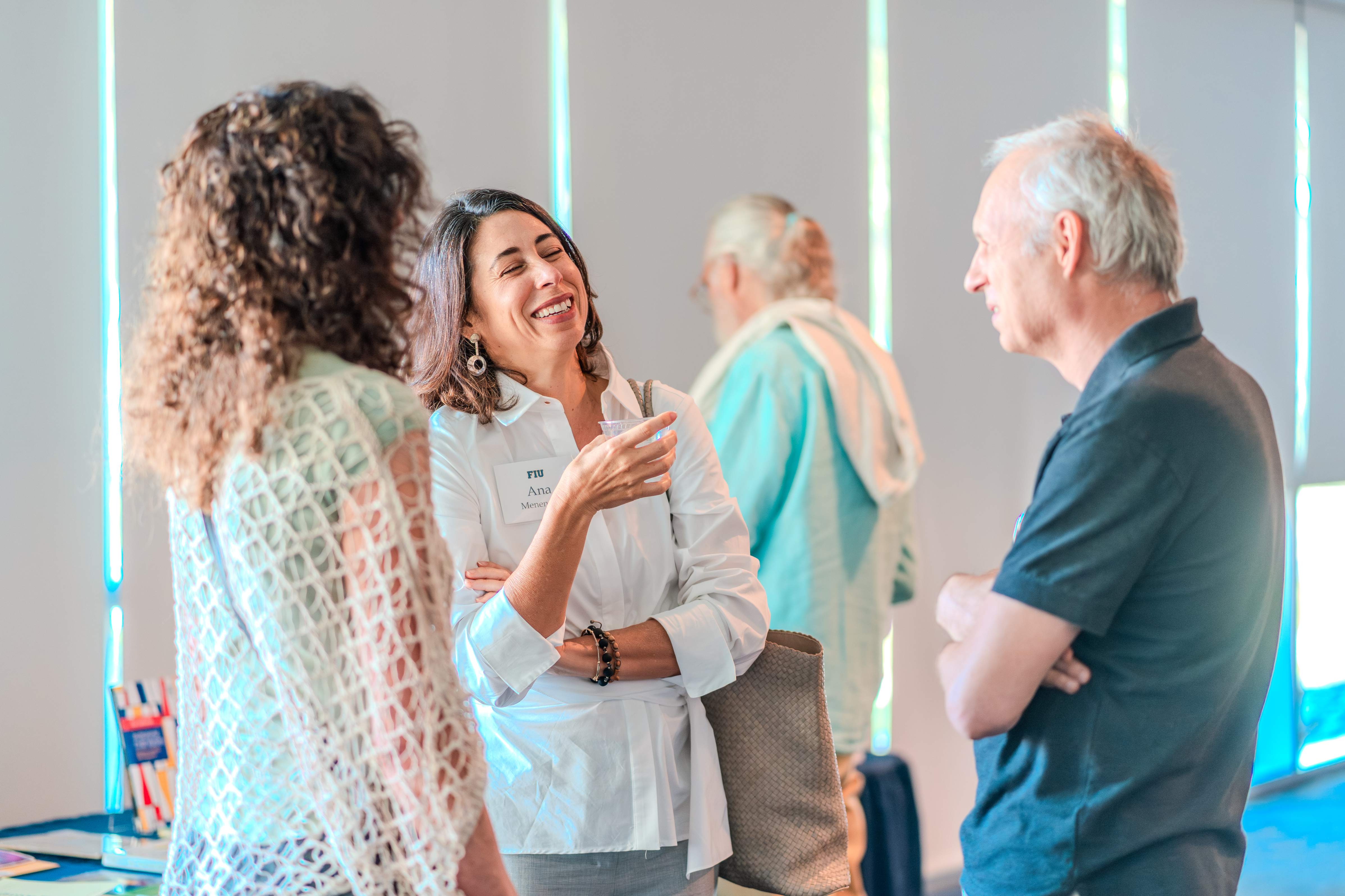 group of adults laughing